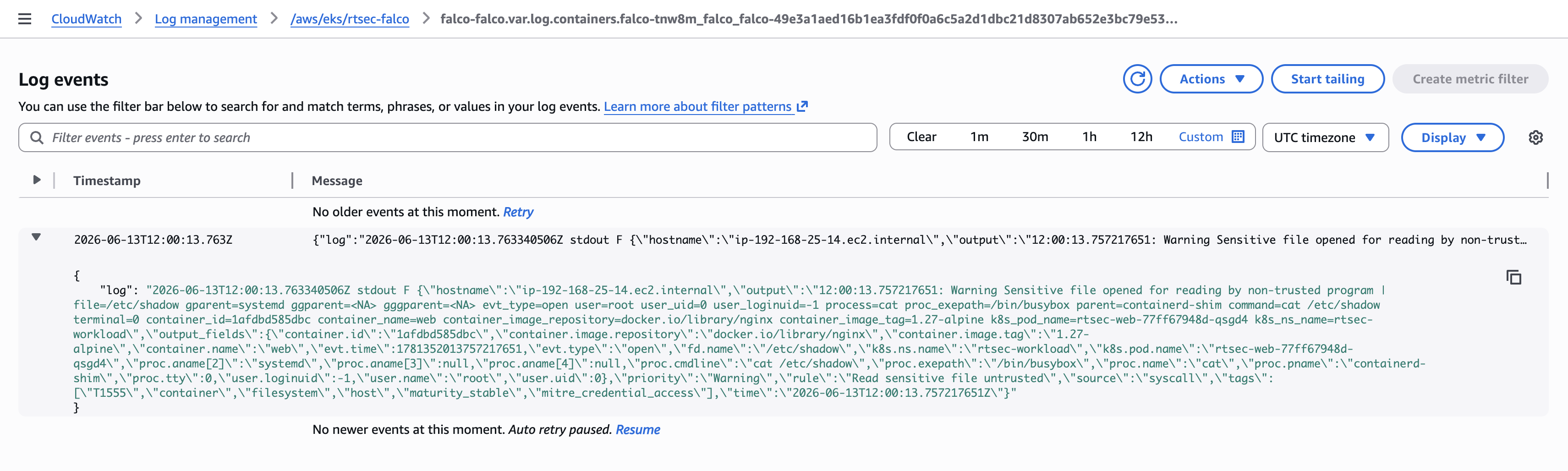 CloudWatch baseline Falco alert event confirming JSON pipeline from Fluent Bit to CloudWatch is working